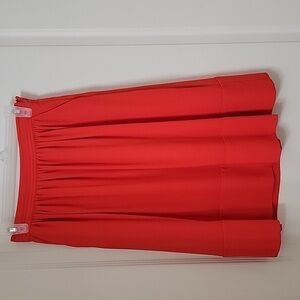 Lila Rose Size 2 Poppy Colored Midi Skirt with Pockets.  Lined, Elastic Waist